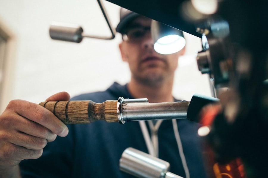 Technician inspecting a component under magnification at a workbench